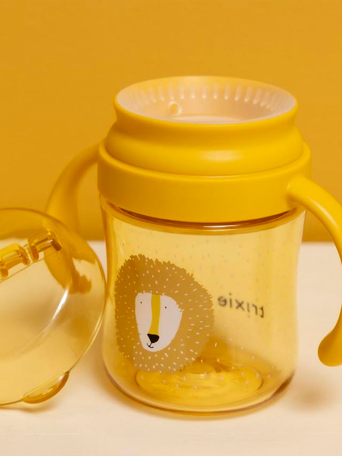 TAZA 360º CON ASAS LION Trixie KIDSME